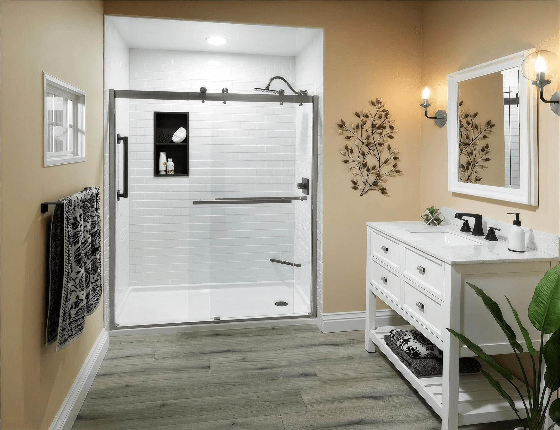 Bright, modern bathroom featuring a spacious walk-in shower with a clear sliding glass enclosure, white subway tile walls, matte black fixtures, built-in storage niche, and a sleek white vanity with contemporary finishes.