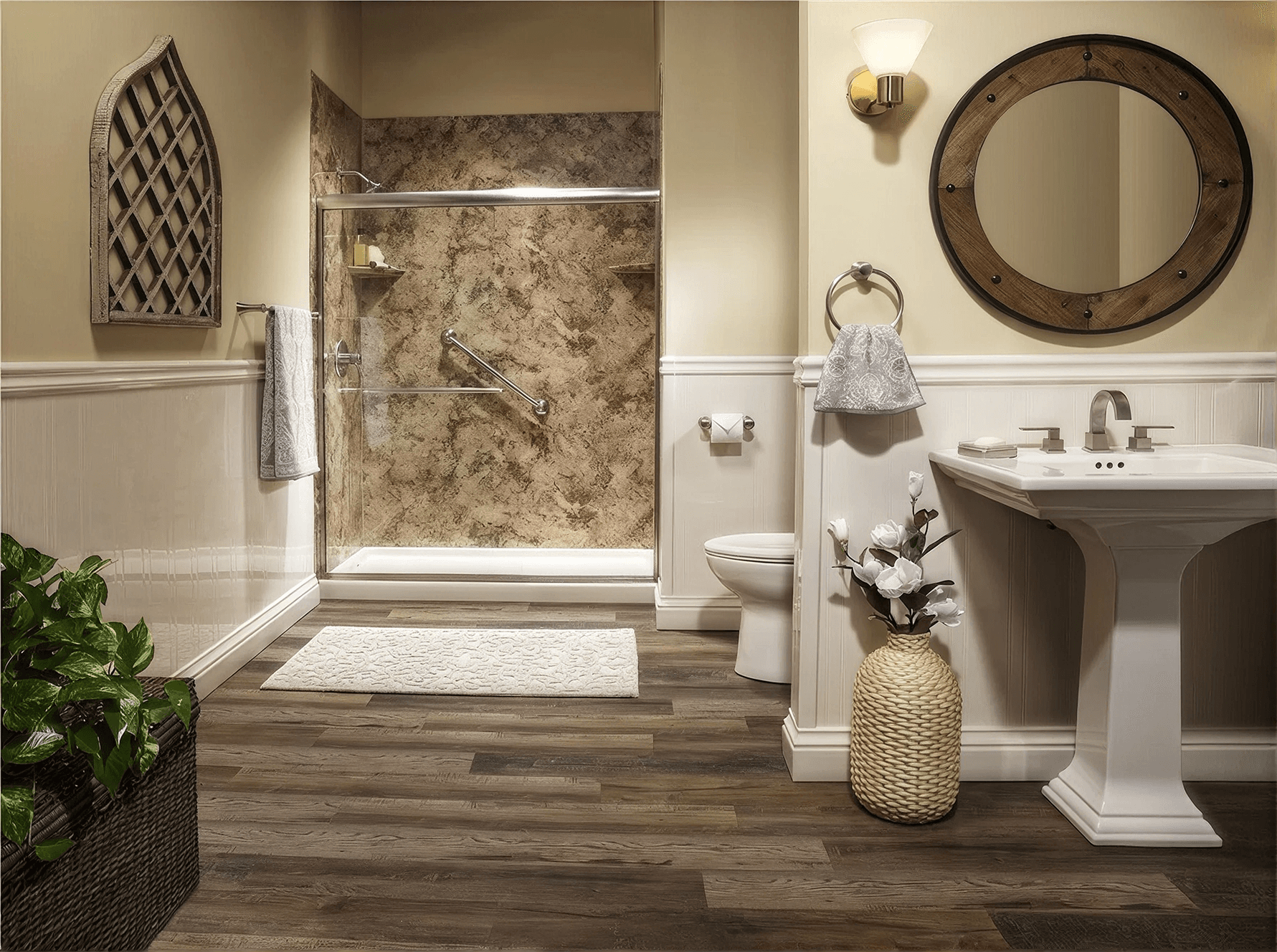 Accessible walk-in shower with a low-threshold entry, grab bar, and stone-look wall surround, complemented by warm wood-look flooring, classic fixtures, and inviting finishes for a comfortable, stylish bathroom.
